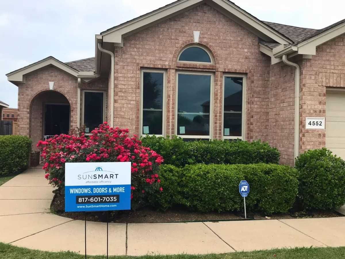 A Dallas–Fort Worth home exterior after a SunSmart window replacement